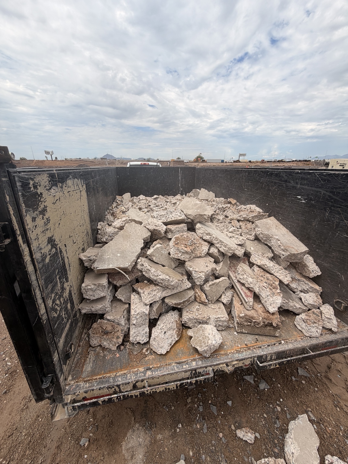 Concrete rubble loaded in True Demo's dump trailer